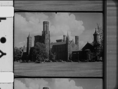 Frame enlargement of 16mm film strip depicting Smithsonian Castle building.